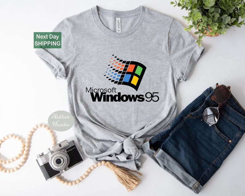 a t - shirt that says microsoft windows 95 on it