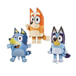 May include: Three foil balloons in the shape of cartoon dogs. One is orange and tan, another is blue, and the third is blue and purple. Each has large eyes and is standing upright with arms and legs.