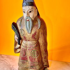 Antique Chinese hand-carved wooden statue