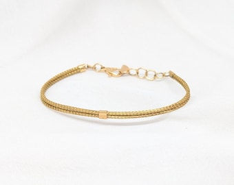 Fine vegetable gold capim dourado bracelet SLOWECO MADRID, Original minimalist ecological chic gift, Semi-rigid jewel, Fair trade Brazil
