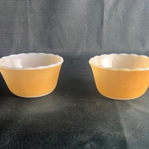 A pair of vintage 4 oz. Fire King Custard Cups—Peach Lustre