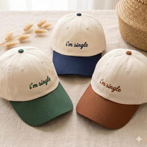 Bestickte Baseballkappe mit sarkastischem Zitat ""Ich bin Single""."