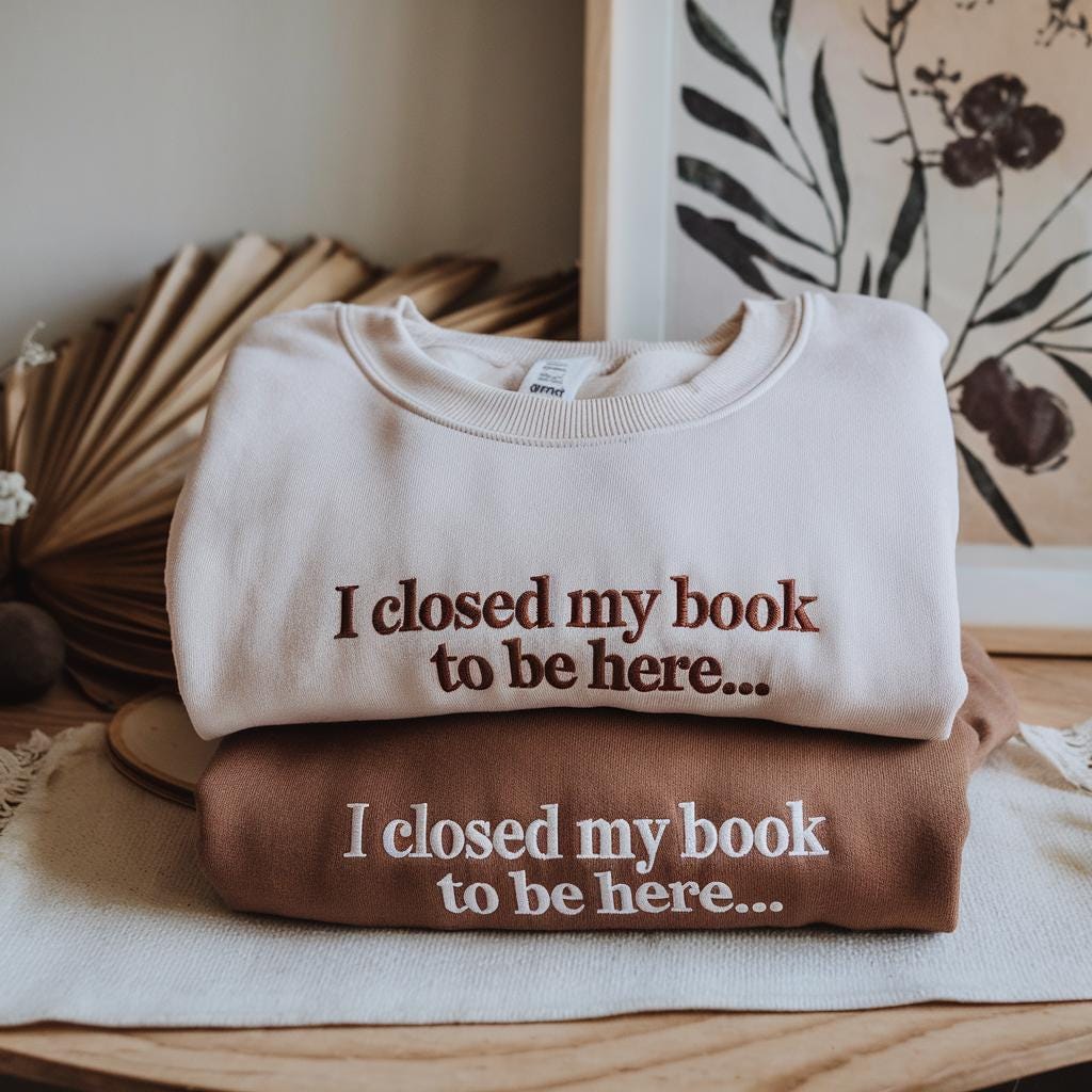 Embroidered Book Sweatshirt: "I Closed My Book To Be Here" Crewneck