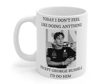 May include: White ceramic mug with a black and white photo of a man in a racing suit. The text on the mug reads "TODAY I DON'T FEEL LIKE DOING ANYTHING EXCEPT GEORGE RUSSELL I'D DO HIM."