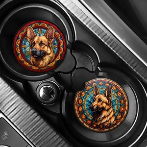 May include: Two round car coasters with a stained glass design featuring a German Shepherd dog. The coasters are brown with a colorful stained glass design and the dog is brown and black.