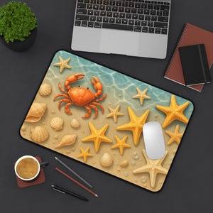May include: A rectangular mousepad featuring a beach scene with an orange crab, yellow starfish, and seashells on a sandy background. The design includes a light blue ocean and bubbles. A white mouse is on the pad.