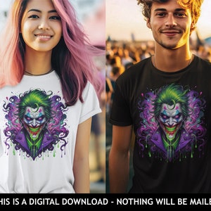 May include: A white and a black t-shirt featuring a graphic print of a green-haired Joker with purple and pink smoke and green dripping paint. The Joker is wearing a purple jacket and has a menacing smile.