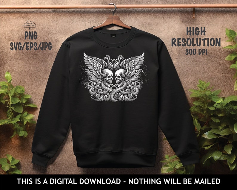 Op de afbeelding: Zwart sweatshirt met een grafische print van twee schedels met vleugels. De schedels kijken elkaar aan en zijn omringd door een bloemmotief.