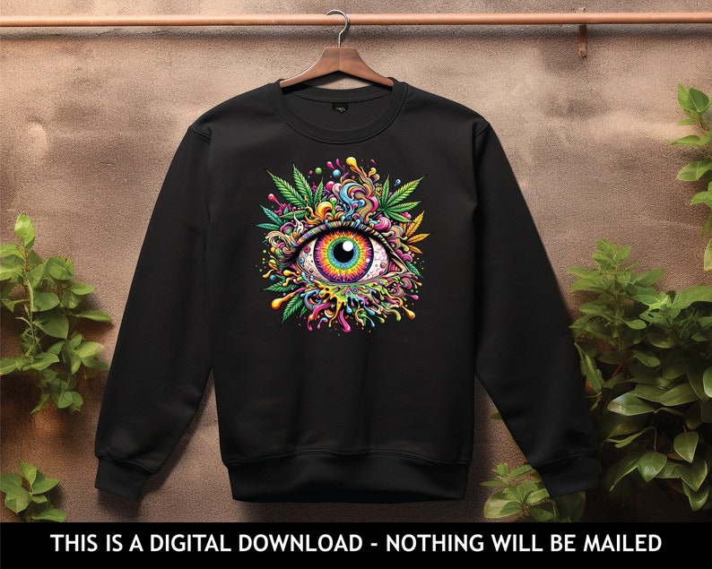 May include: Black sweatshirt with a colorful psychedelic eye graphic. The eye is surrounded by green leaves and colorful swirls.