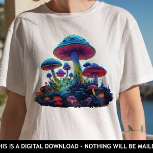 May include: A white t-shirt with a colorful psychedelic mushroom graphic. The mushrooms are in various shades of blue, purple, and pink. The graphic is centered on the shirt.