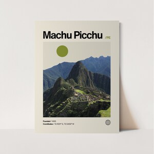 May include: A poster featuring a photograph of Machu Picchu, Peru, with the text "Machu Picchu" in bold black letters. The poster includes the founding year, coordinates, and a green circle. The background shows green mountains and a light beige sky.