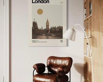 May include: A minimalist poster with a beige background featuring a black and white image of the Houses of Parliament and Big Ben in London, England. The poster has the text "London / GB" and "Founded: AD 43" and "Coordinates: 51.5074° N, 0.1278° W".