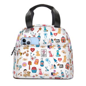 May include: White lunch bag with a black handle and zipper, patterned with veterinary-themed illustrations. The design includes dogs, cats, medical tools, and the text "FIND A VET". A phone is in the front pocket.