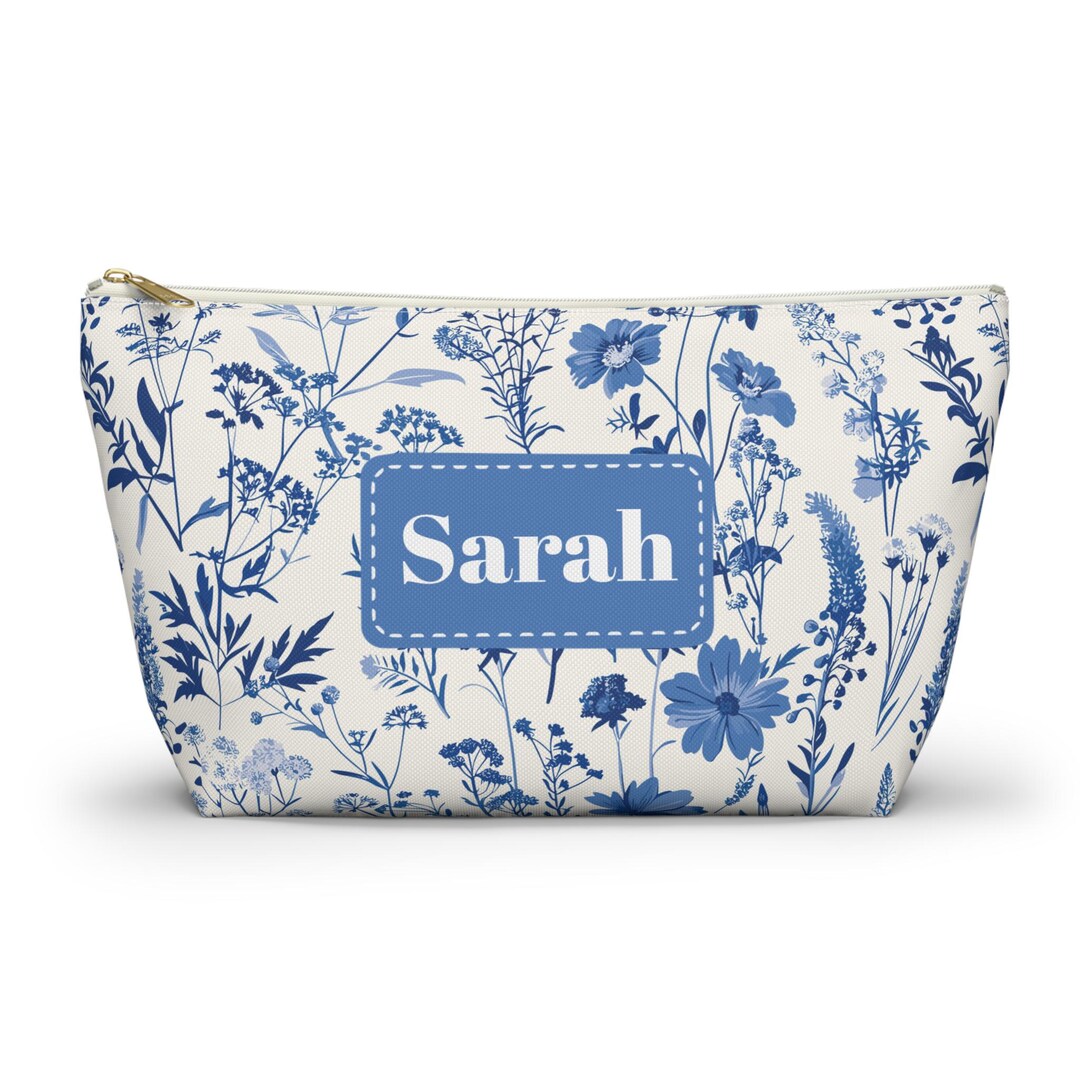 OVERSIZED WRISTLET POUCH TOILE
