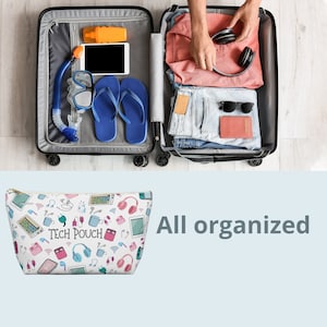 May include: A white zippered pouch with a colorful print of various tech items, including headphones, phones, and charging cables. The pouch has the text "TECH POUCH" printed on it.