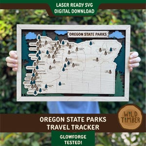 May include: A wooden Oregon State Parks travel tracker map with a light wood frame. The map features laser-cut details of the state's outline, parks, and trees. Text on the map reads "OREGON STATE PARKS TRAVEL TRACKER". The image also includes the text "LASER READY SVG DIGITAL DOWNLOAD" and "GLOWFORGE TESTED!"