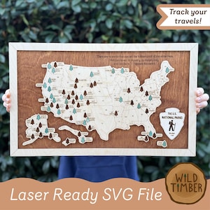 May include: Wooden map of the United States with laser-cut details, including state names and tree icons. The map is framed in light wood and features the text "Track your travels!" and "Laser Ready SVG File."