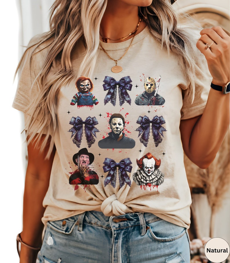 Halloween Horror Character Retro shirt with Black scary Coquette Bows. This shirt has a 3 by 3 pattern of Horror Movie Characters and black bows. It comes on a Bella Canvas shirt in 13 different colors.