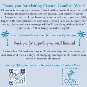 May include: A light blue informational sign for Coastal Comfort Wear featuring dark blue text, two palm tree illustrations, a QR code, and a logo with the letters CCW. The text outlines shop policies, production times, and support information.