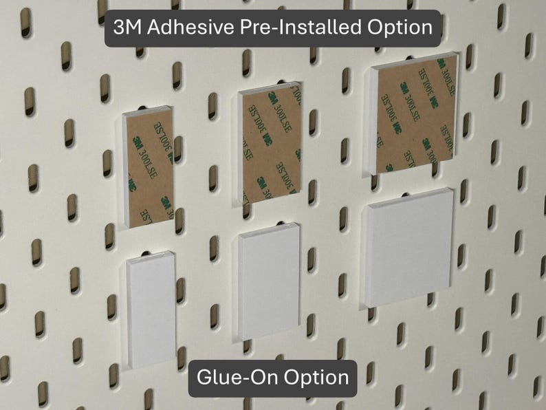 May include: White pegboard accessories with 3M adhesive pre-installed and glue-on options. The image shows rectangular and square pieces, some with brown adhesive tape. Text at the top reads "3M Adhesive Pre-Installed Option" and at the bottom "Glue-On Option."