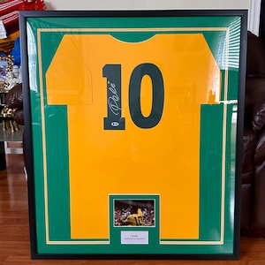 Pele Signed and Framed Jersey Cut Beckett Authenticated