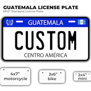 May include: A white and blue Guatemalan license plate with the text "GUATEMALA" and "CUSTOM" in black. The plate also has the text "CENTRO AMÉRICA" in black. The plate is 6 inches by 12 inches.