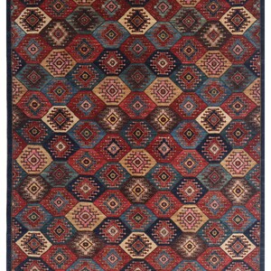 May include: A colorful rug with a geometric pattern in shades of red, blue, brown, and beige. The pattern features repeating diamond shapes with intricate details.