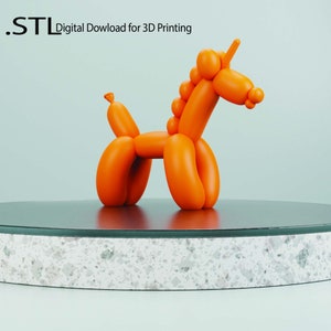 Puede incluir: Animal de globo naranja con forma de unicornio. El unicornio está de pie sobre una plataforma redonda, gris y blanca. El texto ".STL Descarga digital para impresión 3D" está en la esquina superior izquierda de la imagen.