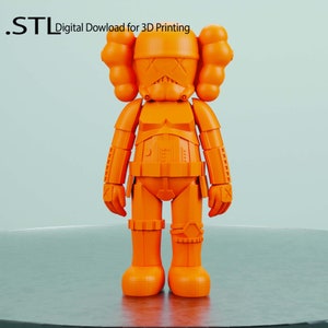 May include: Bright orange 3D-printed figurine of a character with a helmet and X-shaped eyes. The figurine has a rounded head, a detailed chest plate, and boots. The text ".STL Digital Download for 3D Printing" is in the upper left corner.