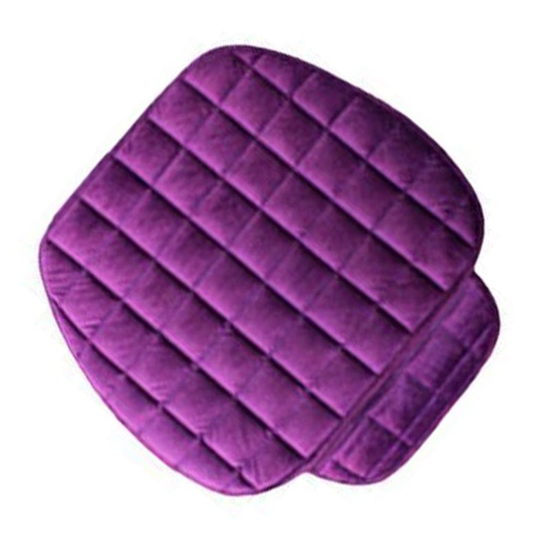 May include: Purple quilted car seat cushion. The cushion is designed to provide comfort and support whilst driving.