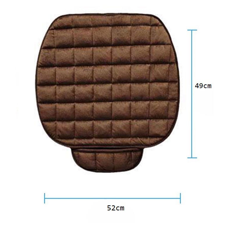 May include: Brown quilted seat cushion with a rectangular shape. The cushion measures 52 cm wide and 49 cm high.