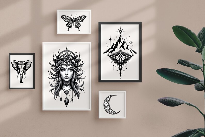 May include: A collection of framed black and white art prints. The prints feature various designs, including a butterfly, a woman's portrait, an elephant, a mountain scene, and a crescent moon. The frames are white and black, displayed on a neutral-colored wall.