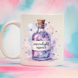 May include: White ceramic mug featuring a watercolor illustration of a potion bottle with a cork stopper. The bottle is filled with a galaxy design and the words "moonlight essence" are printed on a label. The background is a colorful watercolor wash.