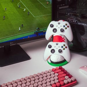 Soporte doble para mando de fútbol