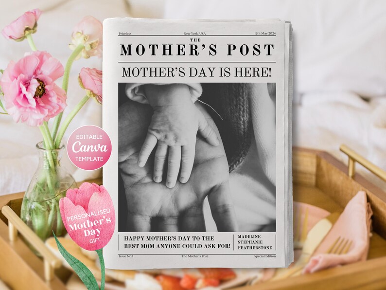 May include: A black and white photo of a mother and child's hands. The photo is on a newspaper with the headline "The Mother's Post" and the text "Mother's Day is Here!" The newspaper also has the text "Happy Mother's Day to the Best Mom Anyone Could Ask For!" and "Madeline Stephanie Featherstone".