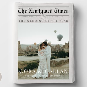 May include: A wedding announcement in the style of a newspaper, with the headline "The Newlywed Times". The announcement features a photo of a couple kissing in front of hot air balloons, with the text "Cora & Callan Are Getting Married Today".