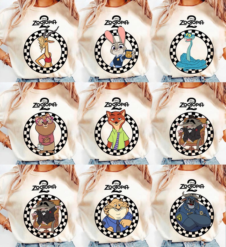 May include: Cream-coloured t-shirts featuring characters from the animated film "Zootopia." Each shirt displays a different character inside a black and white chequered circle, with the film's logo at the top. Characters include a gazelle, rabbit, snake, and others.