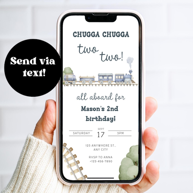 May include: A smartphone displays a birthday invitation with a train theme. The invitation reads "Chugga Chugga, two two!" and "all aboard for Mason's 2nd birthday!" The date is September 17th at 3 PM. A black circle with the text "Send via text!" is on the left.