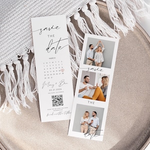 Op de afbeelding: Twee witte "Save the Date" kaarten met elegant schrift. Eén kaart heeft een kalender met een hart op 21 maart 2026. De andere kaart heeft drie foto's in fotohokjesstijl. De kaarten liggen op een neutrale ondergrond met een witte gefranjerde stof.