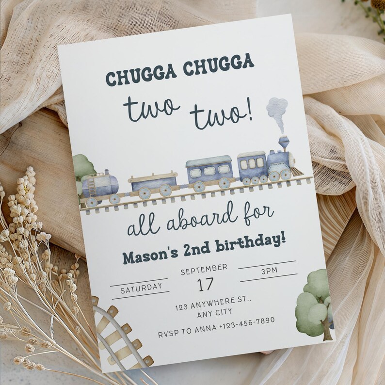 May include: A white invitation card with the text "CHUGGA CHUGGA two two!" and "all aboard for Mason's 2nd birthday!" A watercolor train illustration in blue and gray decorates the top. The date is September 17th, Saturday, at 3 PM.