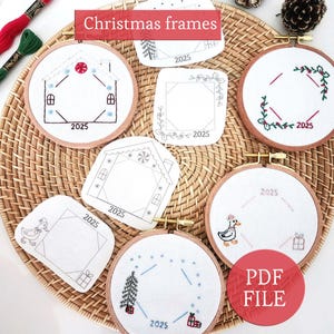 May include: A collection of embroidery hoops and paper cutouts with Christmas-themed designs. The designs include houses, a Christmas tree, and a duck wearing a hat. The text "Christmas frames" and "2025" are visible. The image also includes a "PDF FILE" label.