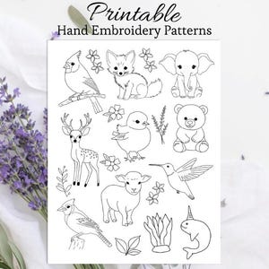 May include: A black and white printable sheet featuring hand embroidery patterns of various animals and floral elements. Designs include a cardinal, fox, elephant, deer, chick, bear, lamb, hummingbird, blue jay, and a narwhal.