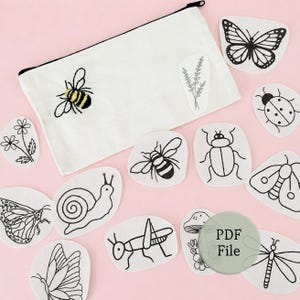 May include: A white fabric zipper pouch featuring an embroidered yellow and black bumblebee and a sprig of lavender. Surrounding the pouch are various white paper cutouts with black line drawings of insects, flowers, and a mushroom, plus a PDF File label.
