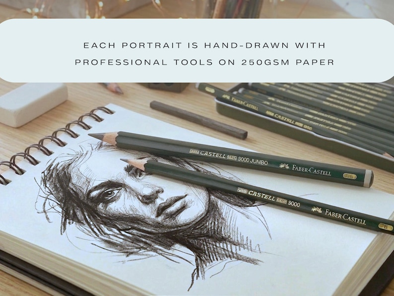 May include: A spiral-bound sketchbook featuring a graphite portrait drawing of a person. Two dark green Faber-Castell 9000 pencils rest on the page. Text reads: EACH PORTRAIT IS HAND-DRAWN WITH PROFESSIONAL TOOLS ON 250GSM PAPER.