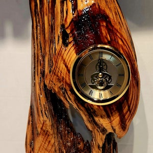 Stunning slice of an Oak with embedded black and gold clock