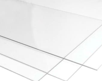 May include: Three clear acrylic sheets stacked on top of each other. The sheets are smooth and transparent.