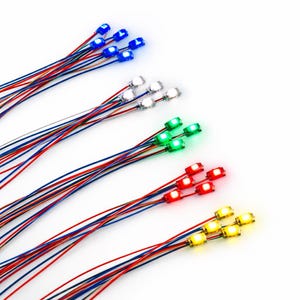 May include: Multiple sets of small LED lights attached to thin, multi-colored electrical wires. The LEDs are arranged in five distinct color groups: blue, white, green, red, and yellow. Each group consists of several individual light units.