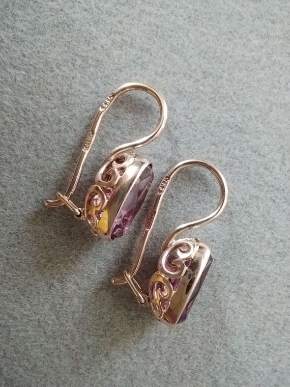 Vintage delicate gold earrings with amethyst stone