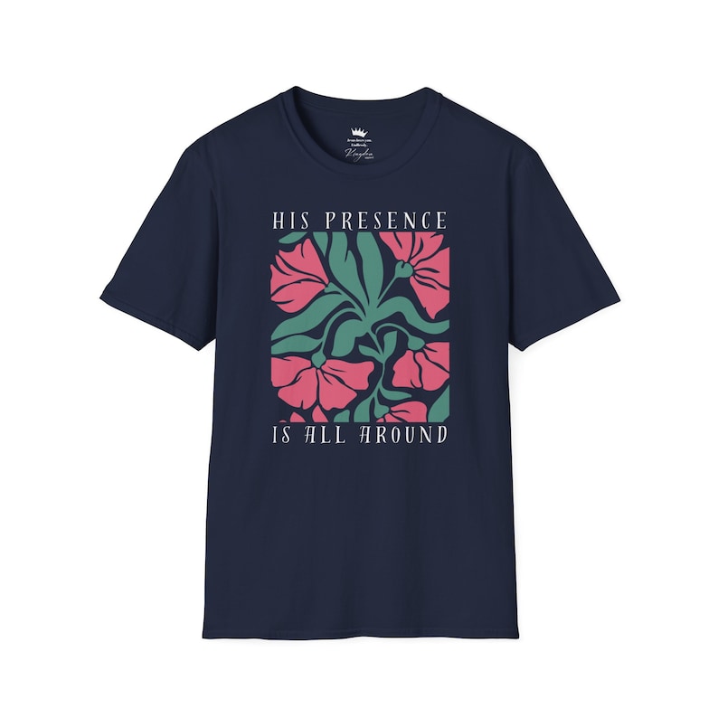 High-quality soft-style t-shirt made with ethically grown cotton. Beautiful floral graphic with a stylish font that says His presence is all around. Color navy.