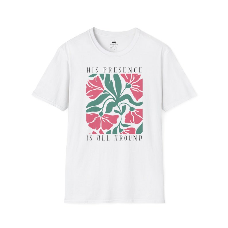 High-quality soft-style t-shirt made with ethically grown cotton. Beautiful floral graphic with a stylish font that says His presence is all around. Color white.